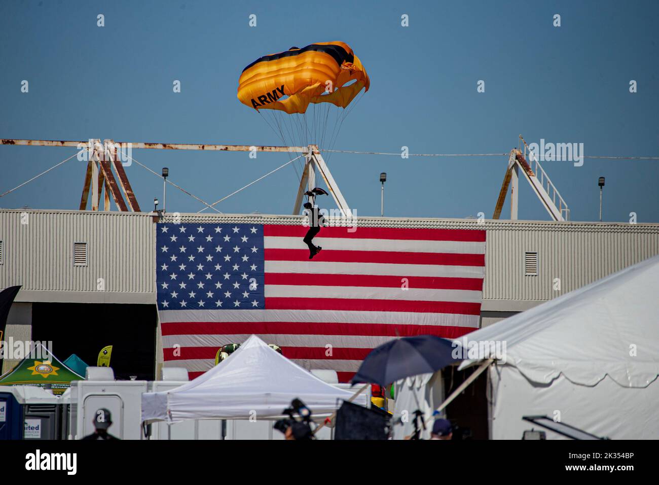 The U.S. Army Parachute Team conducts a demonstration at the 2022 Marine Corps Air Station Miramar Air Show at MCAS Miramar, California, Sept. 23, 2022. Nicknamed the Golden Knights in 1962, “Golden” signifies the gold medals the team won in international competitions, and “Knights” alludes to the team’s ambition to conquer the skies. The Golden Knights perform in more than 100 events per year.  The theme for the 2022 MCAS Miramar Air Show, “Marines Fight, Evolve and Win,” reflects the Marine Corps’ ongoing modernization efforts to prepare for future conflicts. (U.S. Marine Corps photo by Lanc Stock Photo