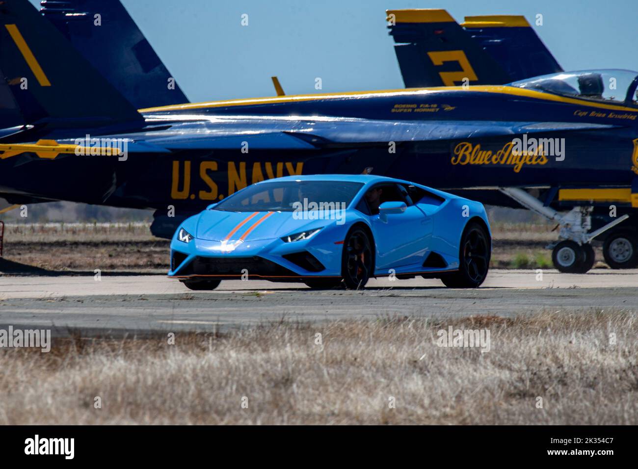 A Lamborghini Aventador drives on the flight line during the 2022 Marine Corps Air Station Miramar Air Show at MCAS Miramar, San Diego, California, Sept. 23, 2022. The theme for the 2022 MCAS Miramar Air Show, “Marines Fight, Evolve and Win,” reflects the Marine Corps’ ongoing modernization efforts to prepare for future conflicts. (U.S. Marine Corps photo by Lance Cpl. Zachary Larsen) Stock Photo