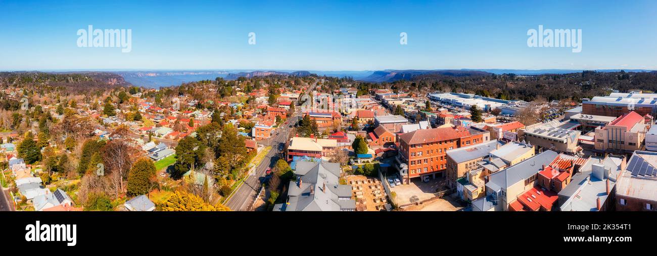 Rooftops of houses on local residential streets in Katoomba town of Australian Blue Mountains - low aerial panorama. Stock Photo