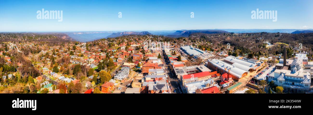 Aerial panorama of downtown of Katoomba town in Blue Mountains of Australia - famous Three Sisters rock formation. Stock Photo