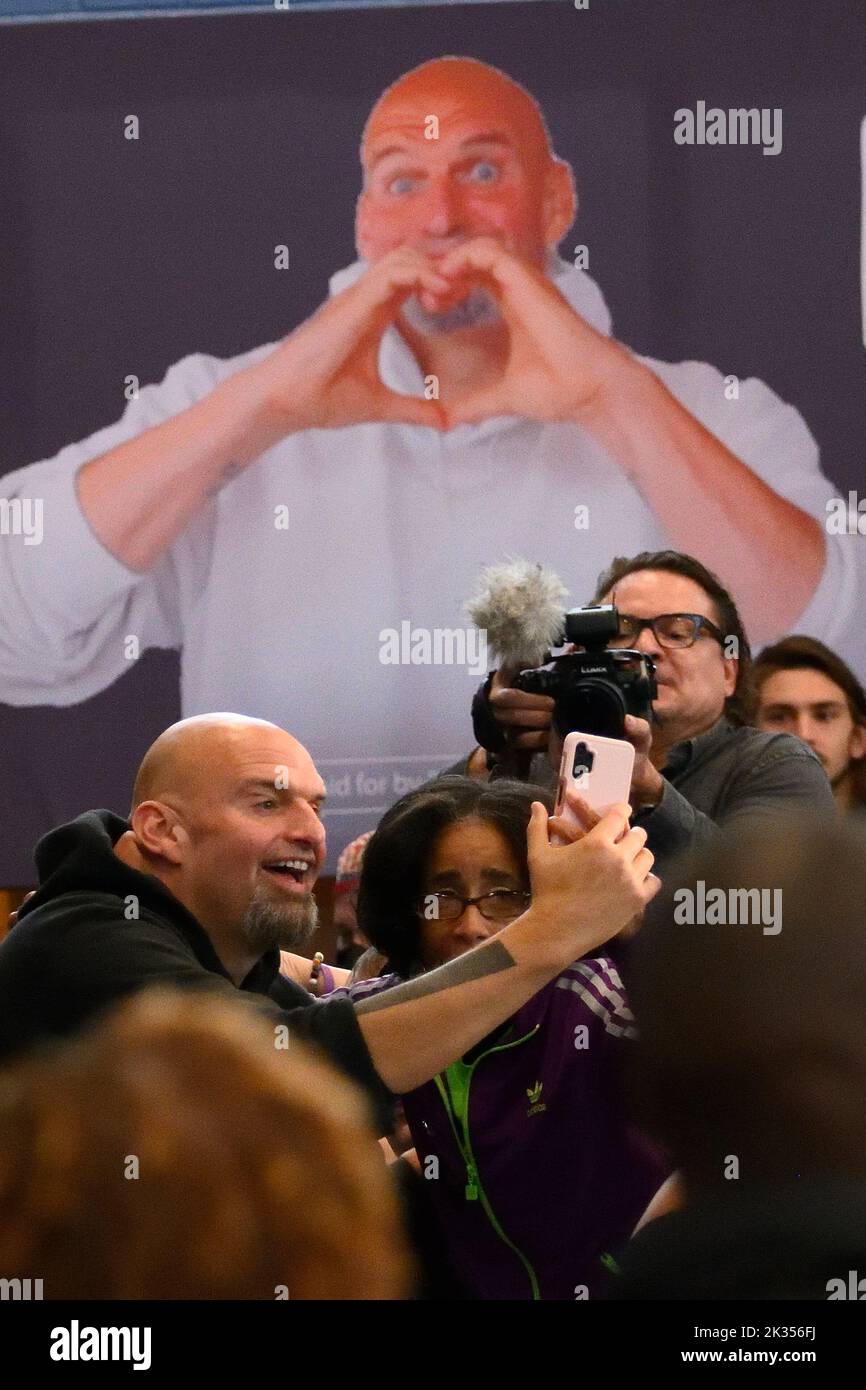 Philadelphia, United States. 24th Sep, 2022. John Fetterman, Democratic candidate for Senator takes photos with supporters after speaking at a campaign event with Congressman Dwight Evans in Philadelphia, PA, USA on September 24, 2022. Fetterman is the Democratic candidate for U.S. Senate and runs against Republican candidate Dr. Mehmet Oz. Credit: OOgImages/Alamy Live News Stock Photo
