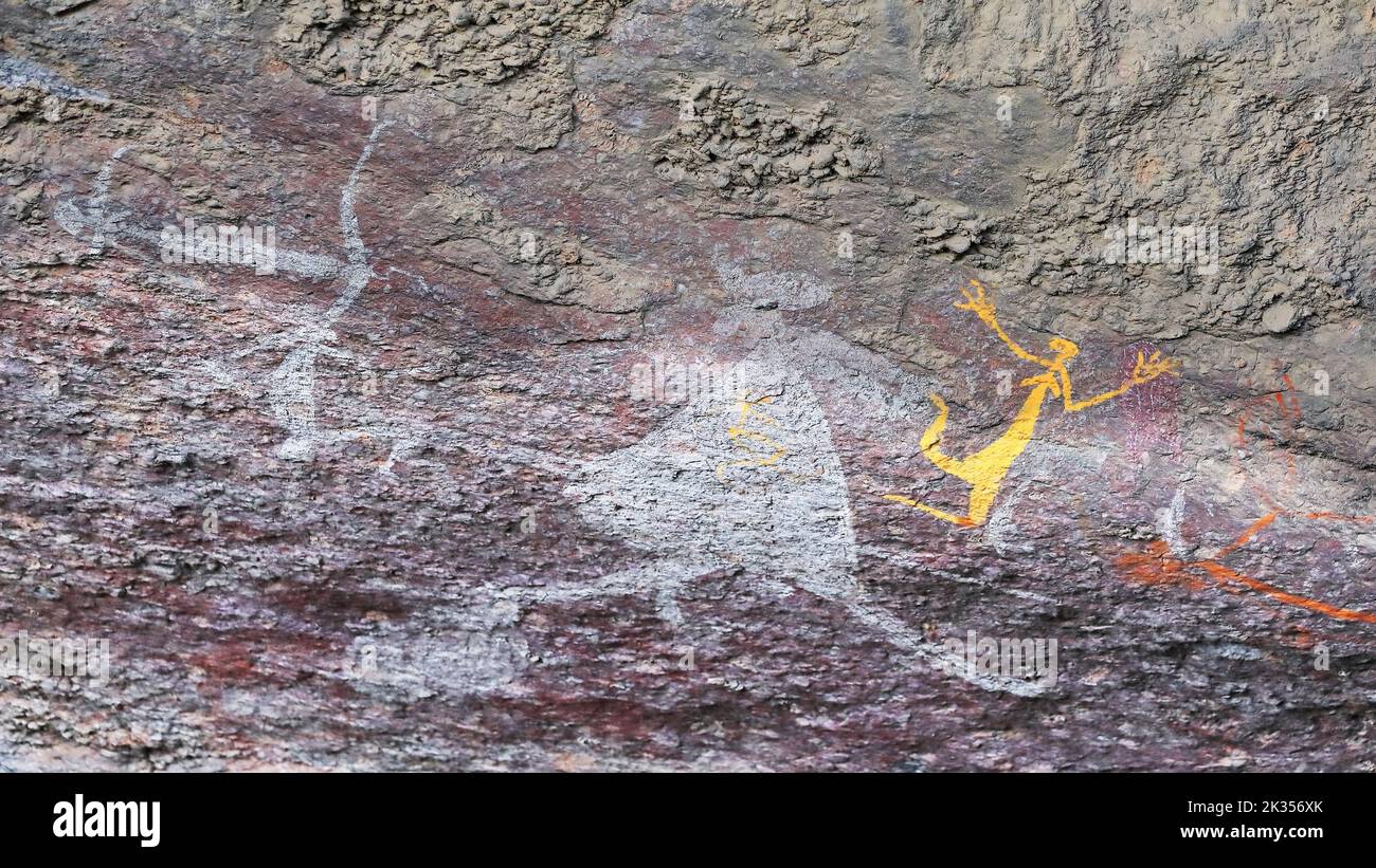 Aboriginal rock art: Kangaroo being hunted-man with spear-yellow woman. Anbangbang-Burrungkuy-Australia-200 Stock Photo