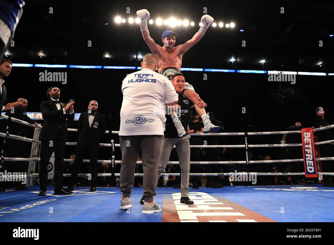 Maxi Hughes is lifted up by Josh Warrington after his victory in the IBO World Lightweight title fight against Kid Galahad at Motorpoint Arena, Nottingham. Picture date: Saturday September 24, 2022. Stock Photo