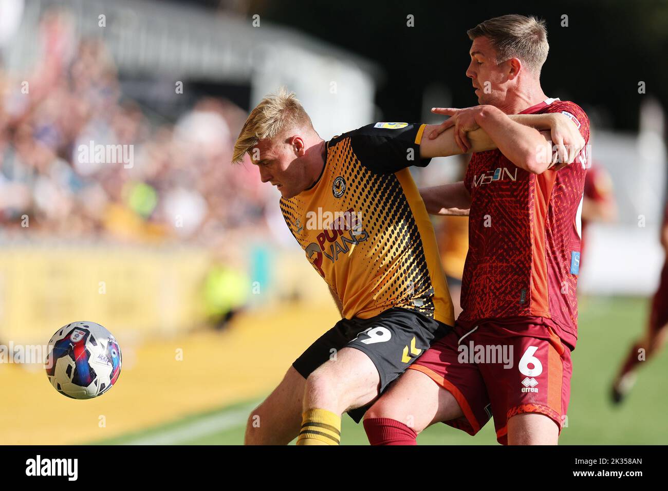 Newport, UK. 24th Sep, 2022. Will Evans of Newport County (l) & Paul Huntington of Carlisle Utd (r) in action. EFL football league two match, Newport county v Carlisle Utd at Rodney Parade in Newport, Wales on Saturday 24th September 2022. this image may only be used for Editorial purposes. Editorial use only, license required for commercial use. pic by Andrew Orchard/Andrew Orchard sports photography/Alamy Live news Credit: Andrew Orchard sports photography/Alamy Live News Stock Photo