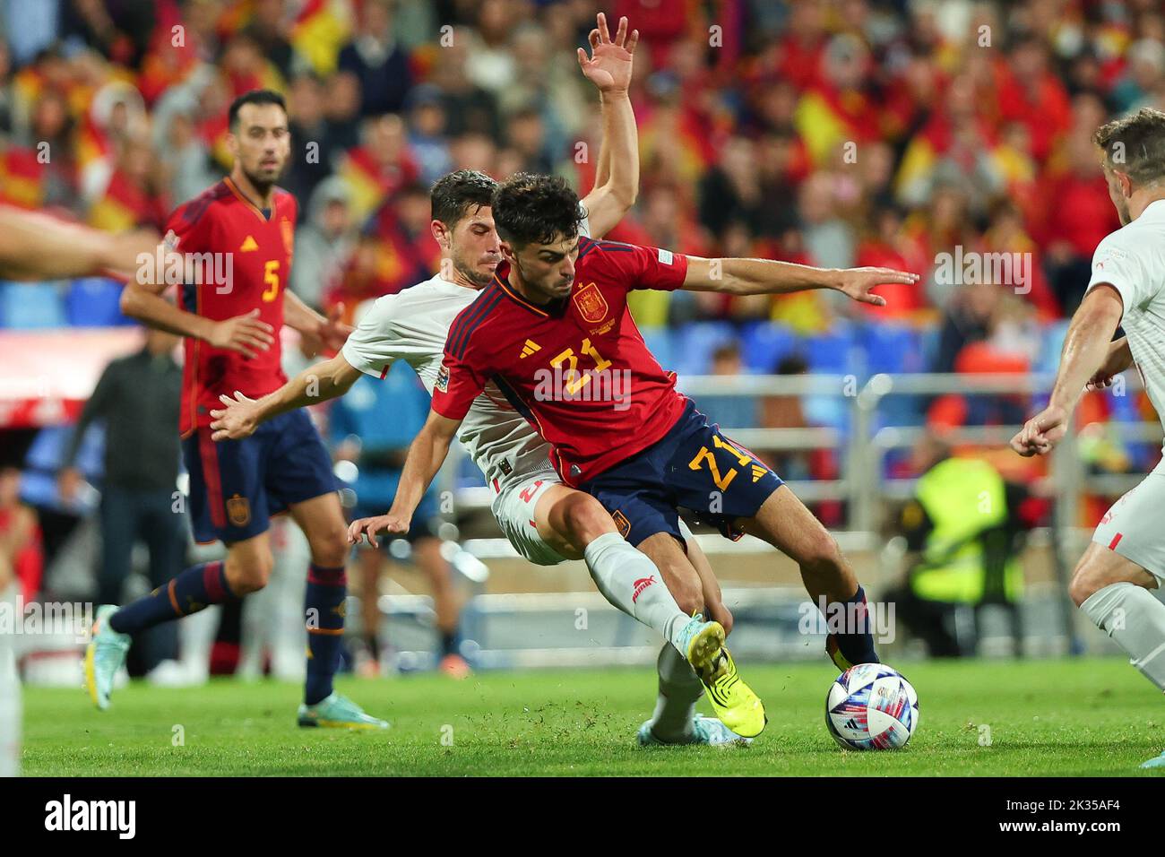 Pedri of Spain in action with Remo Freuler of Switzerland during the UEFA Nations League League A Group 2 match between Spain and Switzerland at La Romareda on September 24, 2022 in Zaragoza, Spain Stock Photo