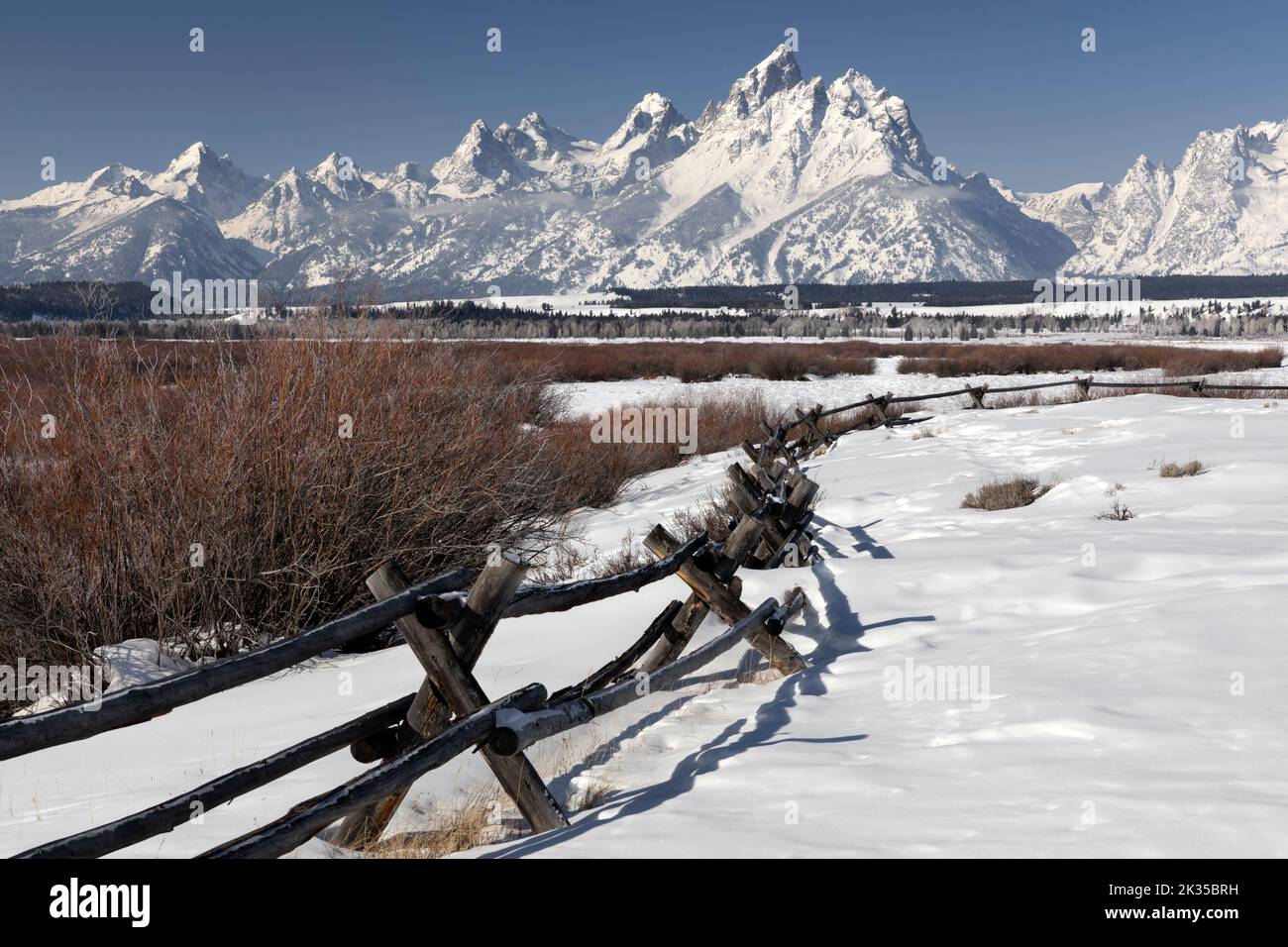 WY05077-00.....WYOMING - View of the Teton Range in winter from Cunningham Cabin Historic Site in Grand Teton National Park. Stock Photo