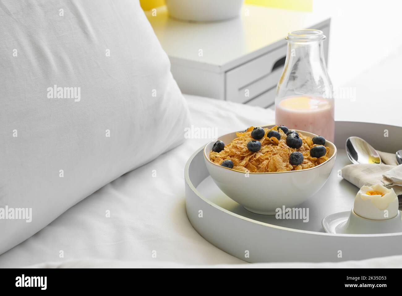 Corn choco flakes cereal in tray with milk and pear slices isolated on  black gray background, a delicious and healthy dietary breakfast. Top View  Stock Photo - Alamy