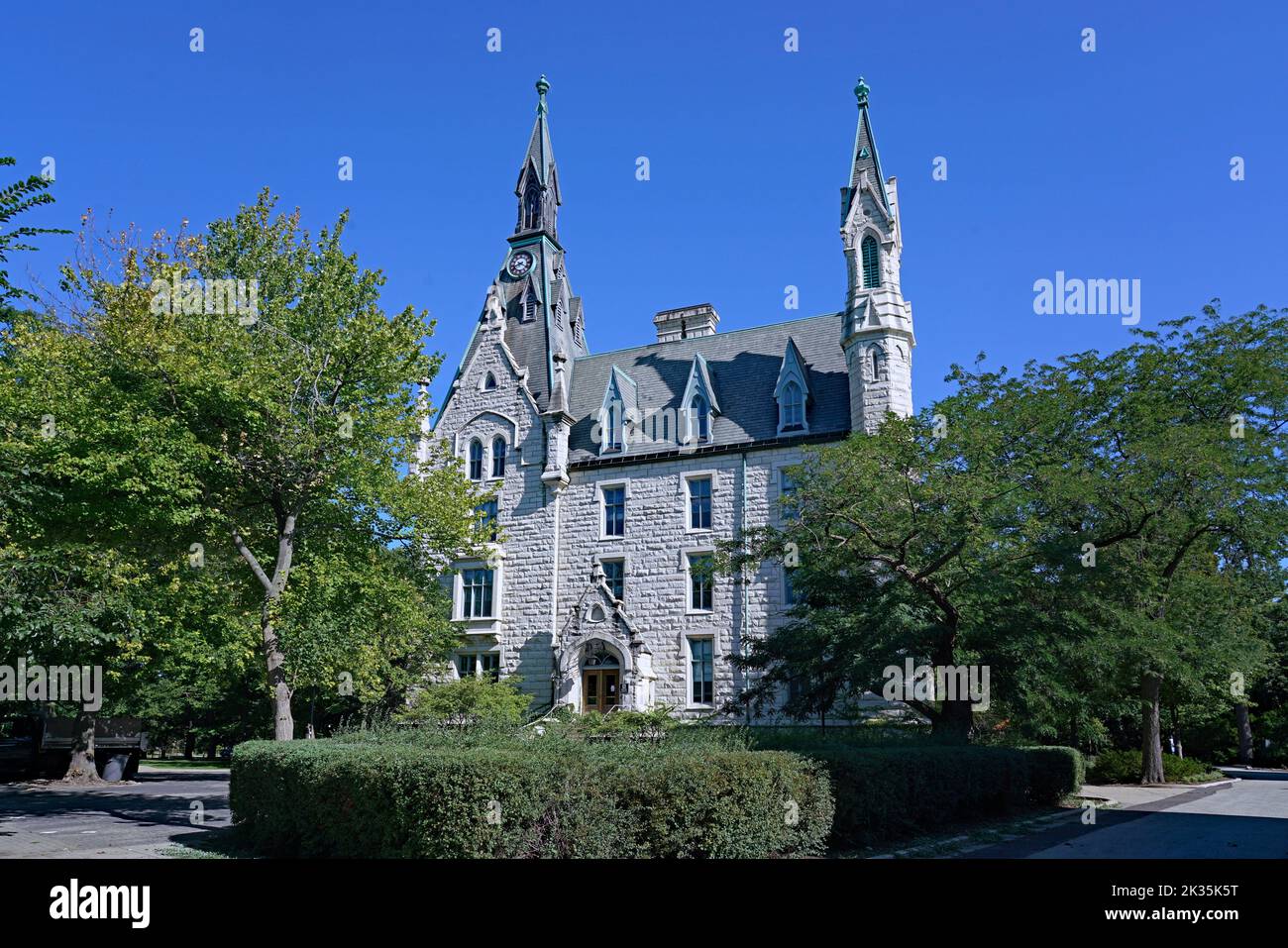 Evanston, IL, USA - August 2022:  University Hall, built in 1869, the oldest building on the campus of Northwestern University. Stock Photo