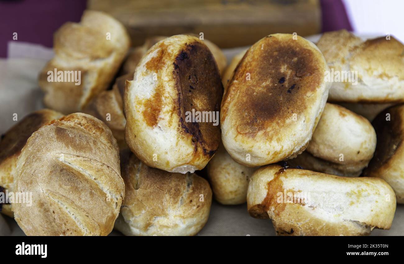 Detail of bread stuffed with hot chorizo, typical Spanish food Stock Photo