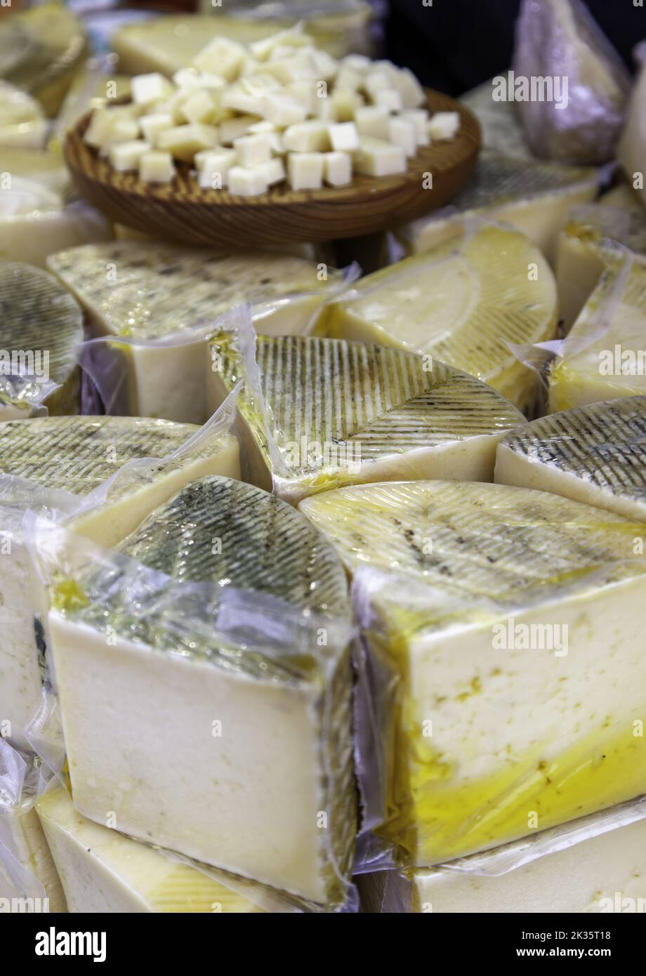 Detail of artisanal dairy product in an old market in Europe Stock Photo
