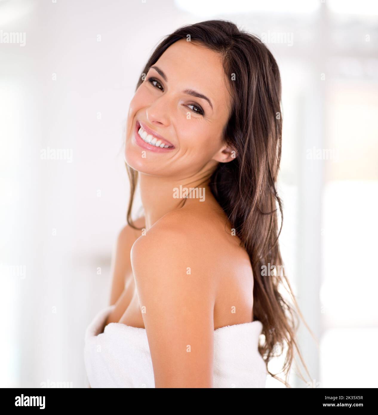 Naturally beautiful. Portrait of a beautiful woman wrapped in her towel ...