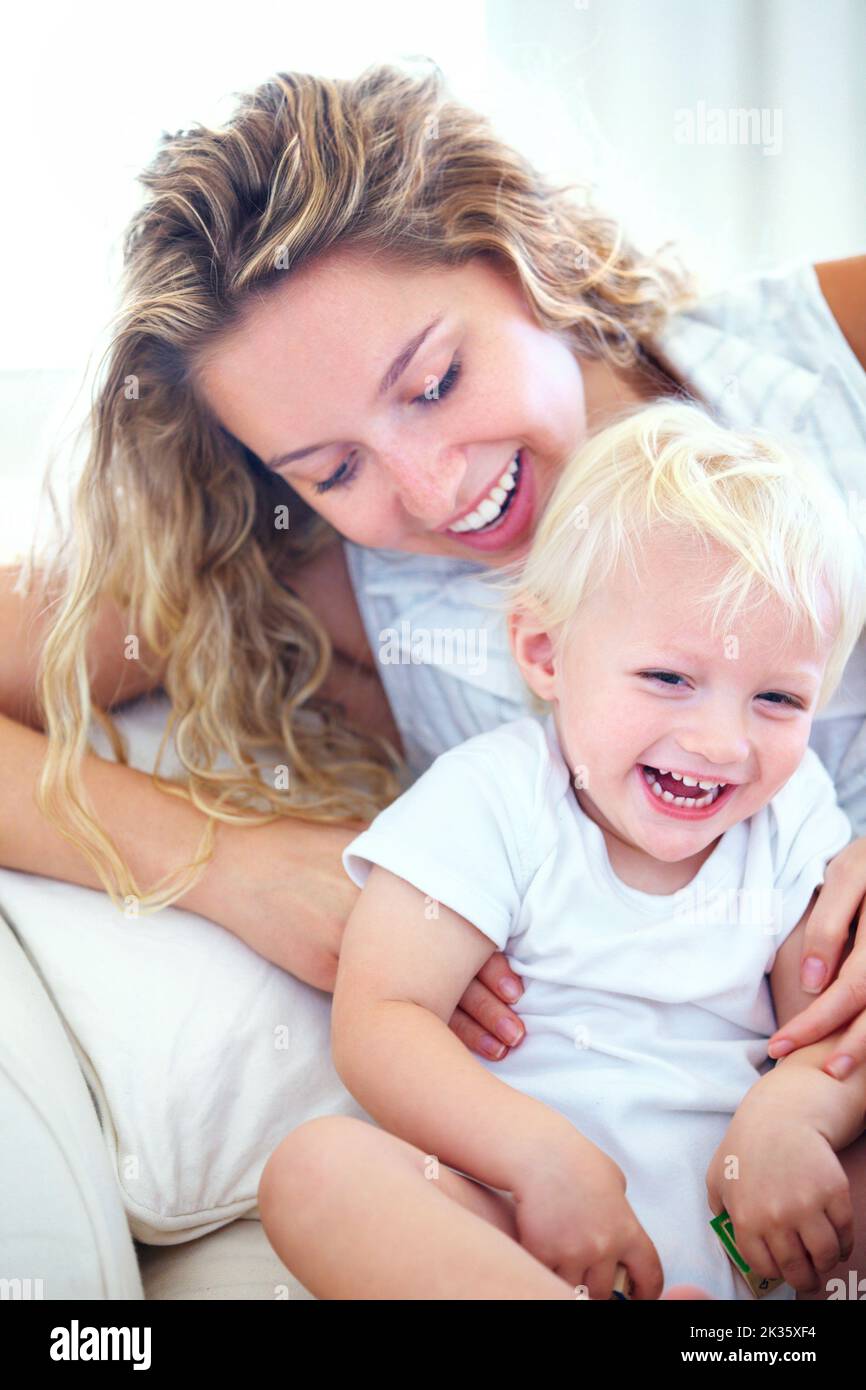 Hes my whole world Motherly love. an affectionate young mother