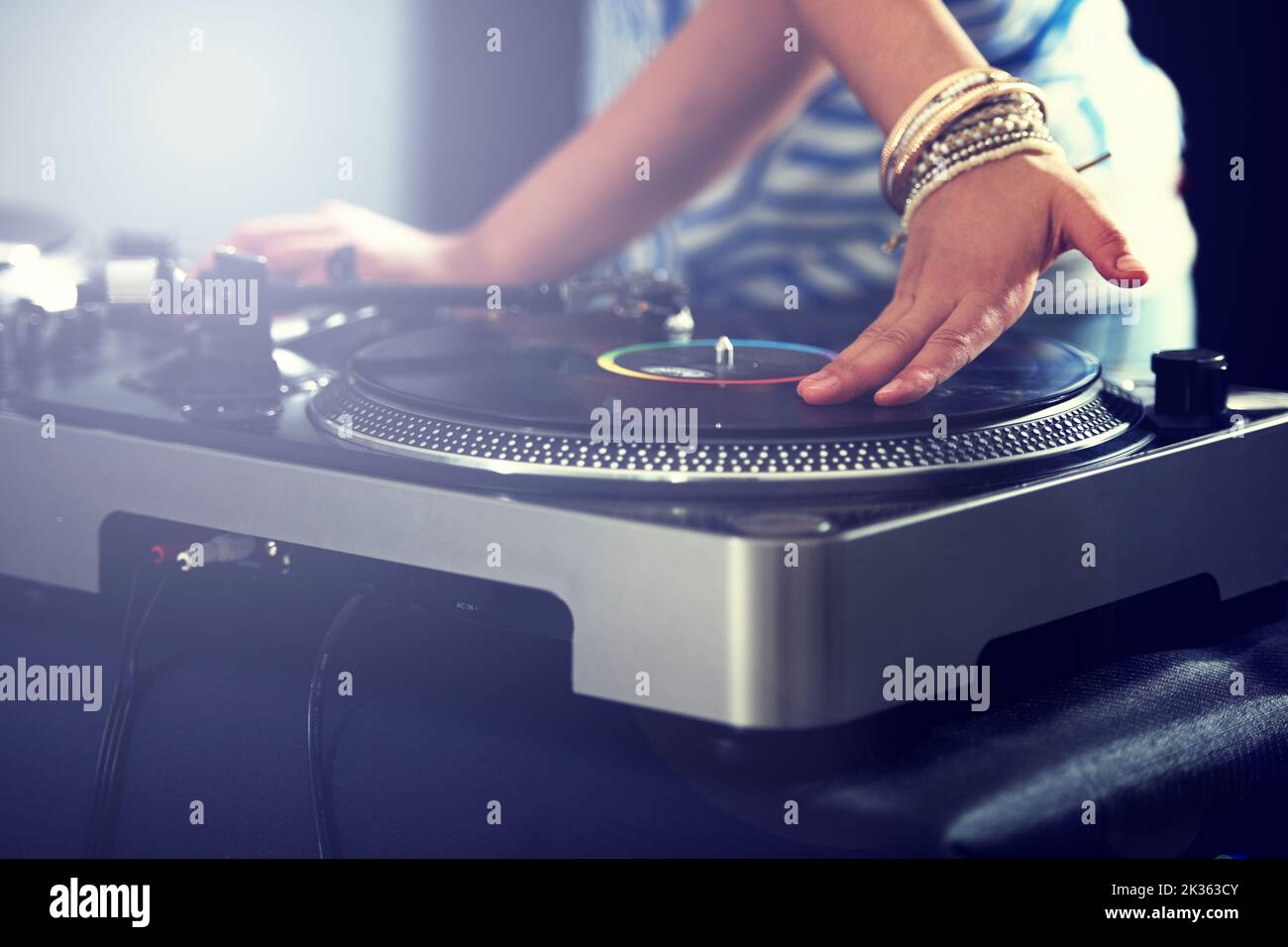 Mixing up the perfect musical offering. Cropped view of a DJ mixing