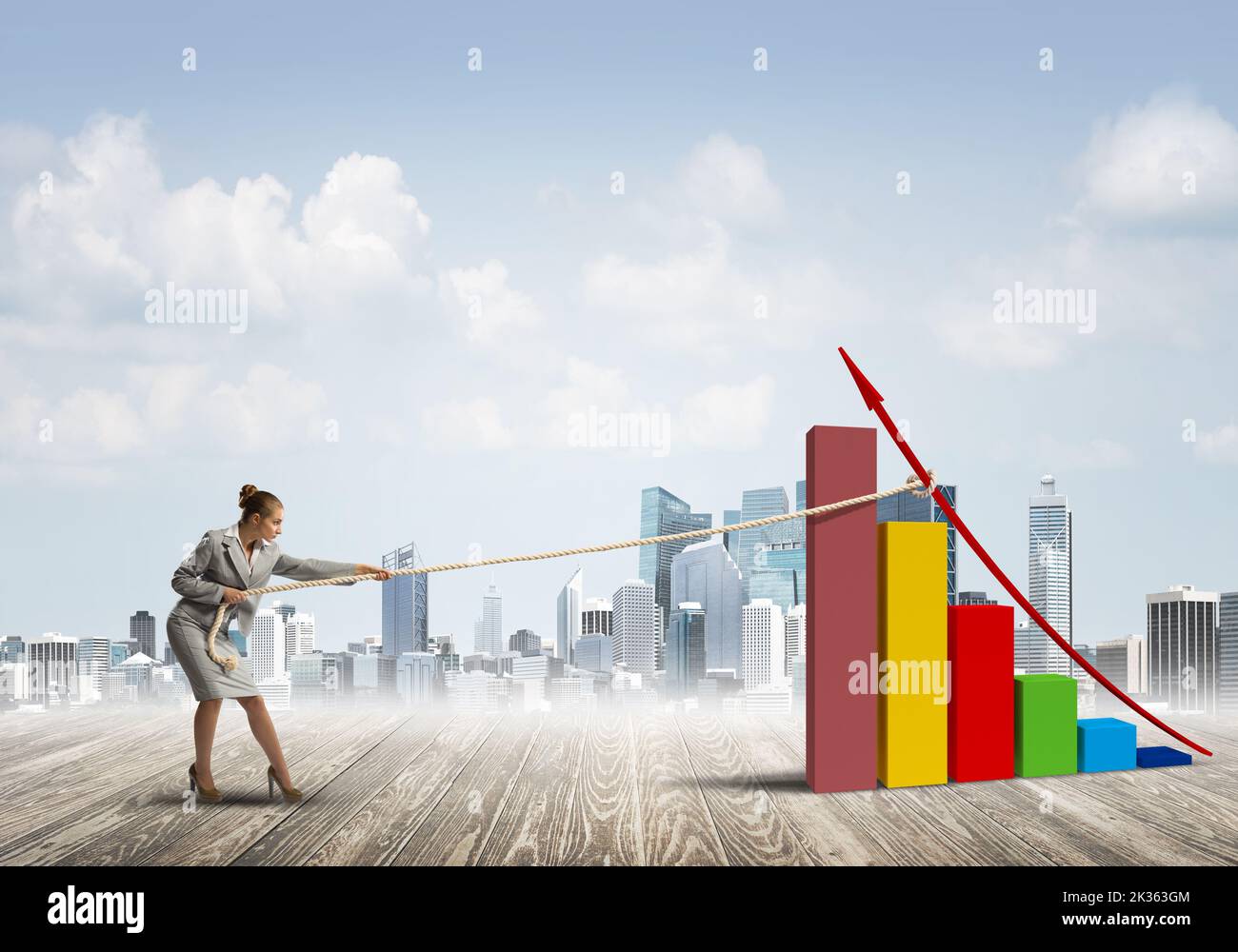 Businesswoman pulling graph with rope as concept of power and control Stock Photo