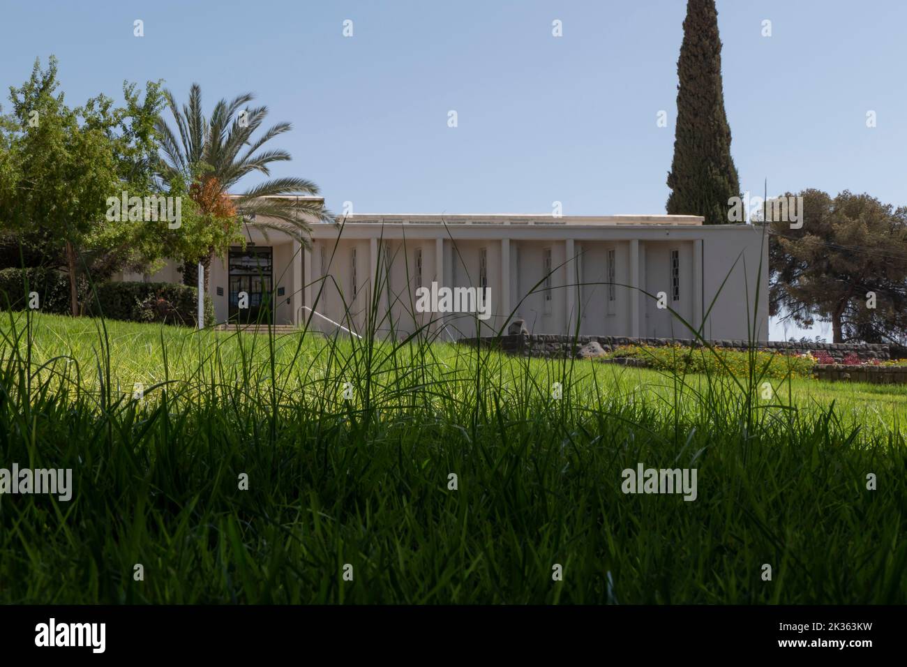 Exterior of Mishkan Museum of Art located on the grounds of Kibbutz Ein Harod Meuhad in Israel. The museum was designed by architect Samuel Bickels, inaugurated in 1948 and was the first rural museum run by a kibbutz. Stock Photo