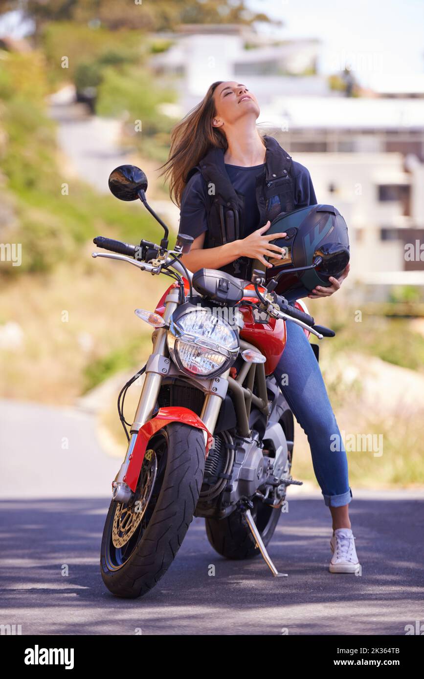 Woman riding on back motorcycle hi-res stock photography and images - Alamy
