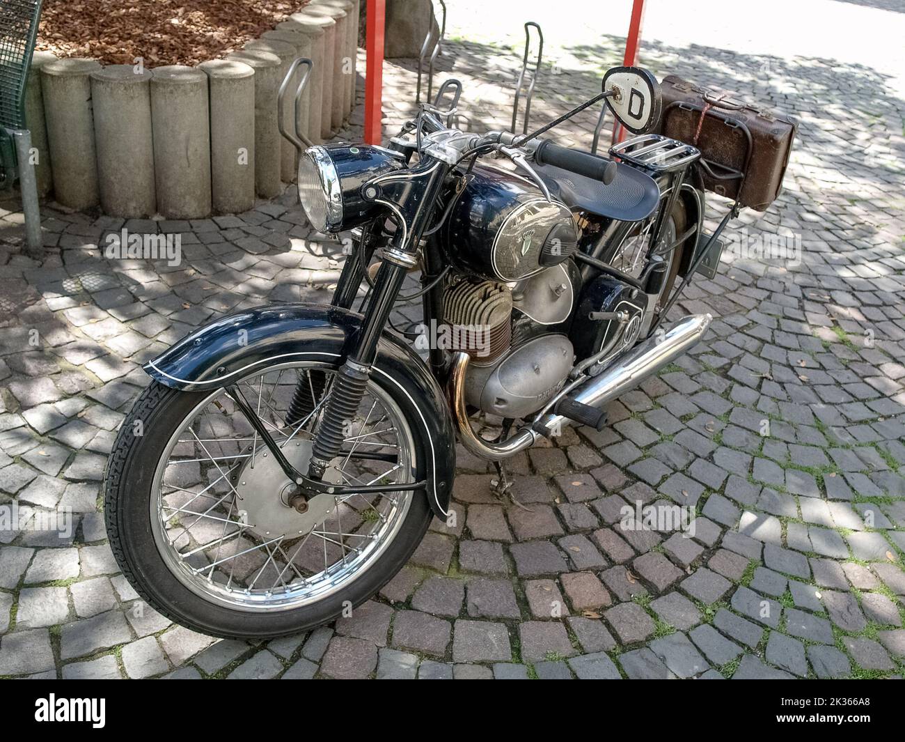 Auto Union DKW (Dampf-Kraft-Wagen) RT motorcycle oldtimer with leather suitcase standing in the old town of Linz am Rhein, Germany Stock Photo