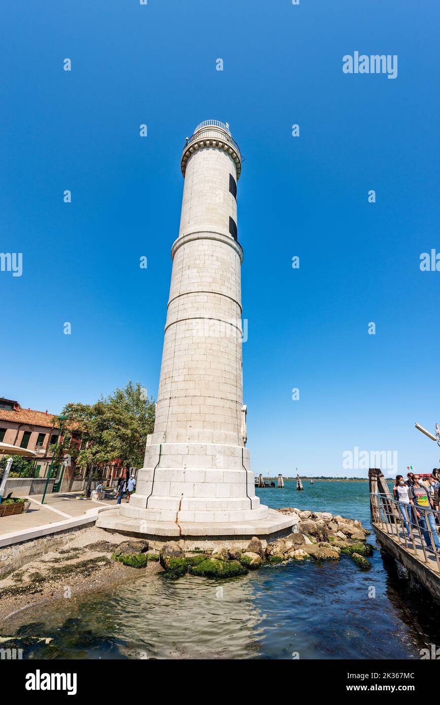 Ancient lighthouse of Murano island. Vaporetto station (ferry) called Murano Punta Faro, Venice Lagoon, Venice, Veneto, Italy, Europe. Stock Photo