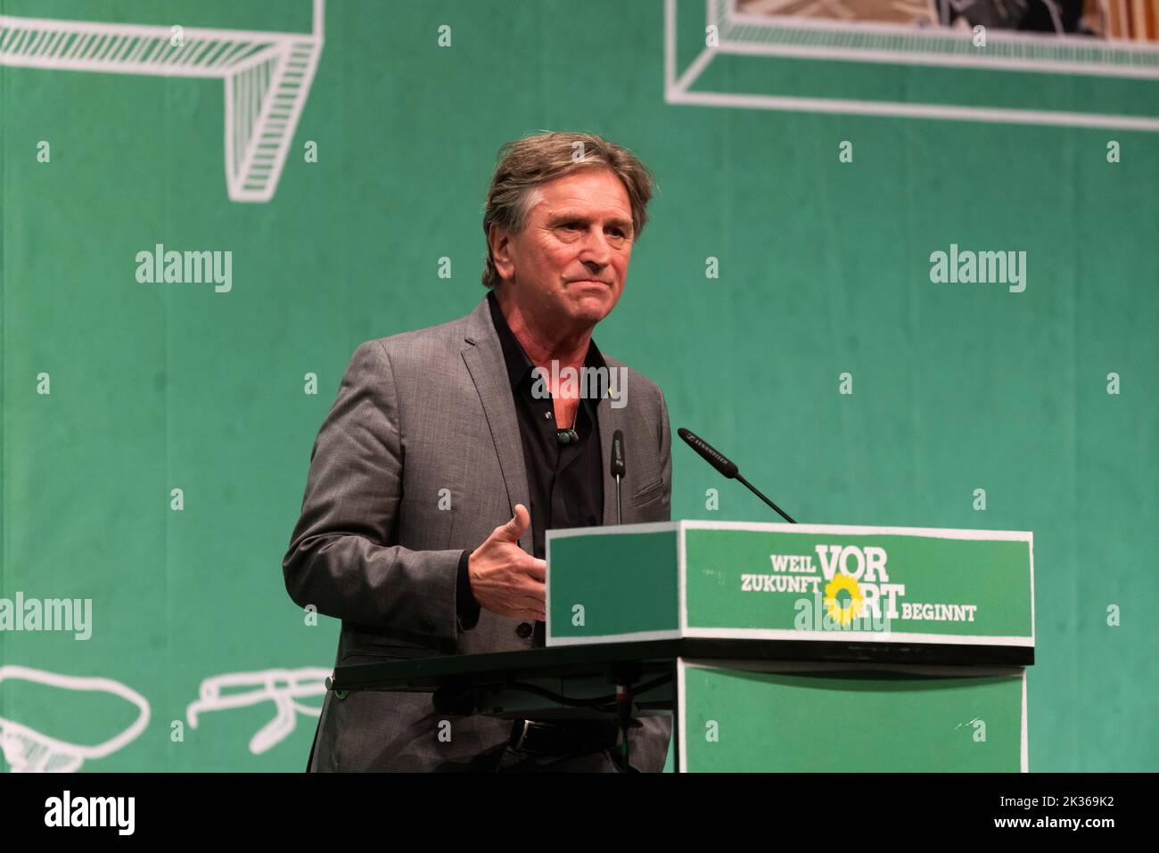 24 September 2022, Baden-Wuerttemberg, Donaueschingen: Manfred 'Manne' Lucha (Bündnis 90/Die Grünen), Minister of Health of Baden-Württemberg, stands on stage and speaks during the state party conference of his party. Bündnis 90/Die Grünen in Baden-Württemberg come together again in presence after several online party conferences. In Donaueschingen, they want to distinguish themselves as a party of rural areas. There could be disputes about budgetary policy. Alliance 90/The Greens in Baden-Württemberg are coming together again in presence after several online party conferences. In Donaue Stock Photo