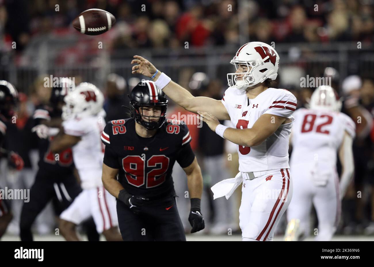 Columbus, United States. 24th Sep, 2022. Wisconsin Badgers Graham Mertz (5) throws a pass under pressure from the Ohio State Buckeyes Caden Curry (92) in the second half in Columbus, Ohio on Saturday, September 24, 2022. Photo by Aaron Josefczyk/UPI Credit: UPI/Alamy Live News Stock Photo