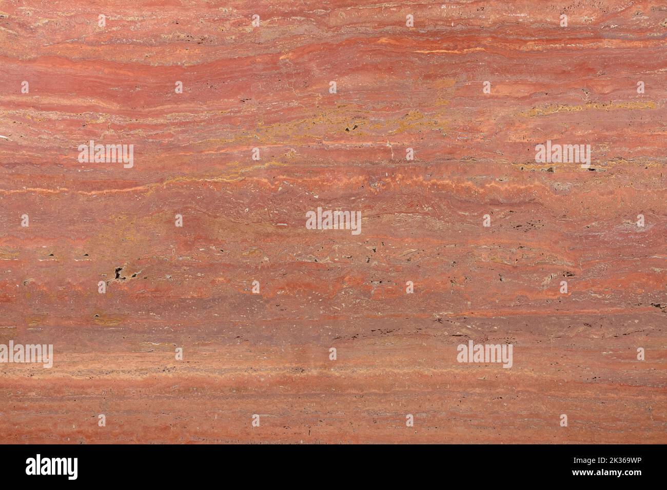 Red Travertin - natural classic travertine stone, photo of slab texture for perfect interior. Matt grunge pattern for exterior home decoration, floor Stock Photo