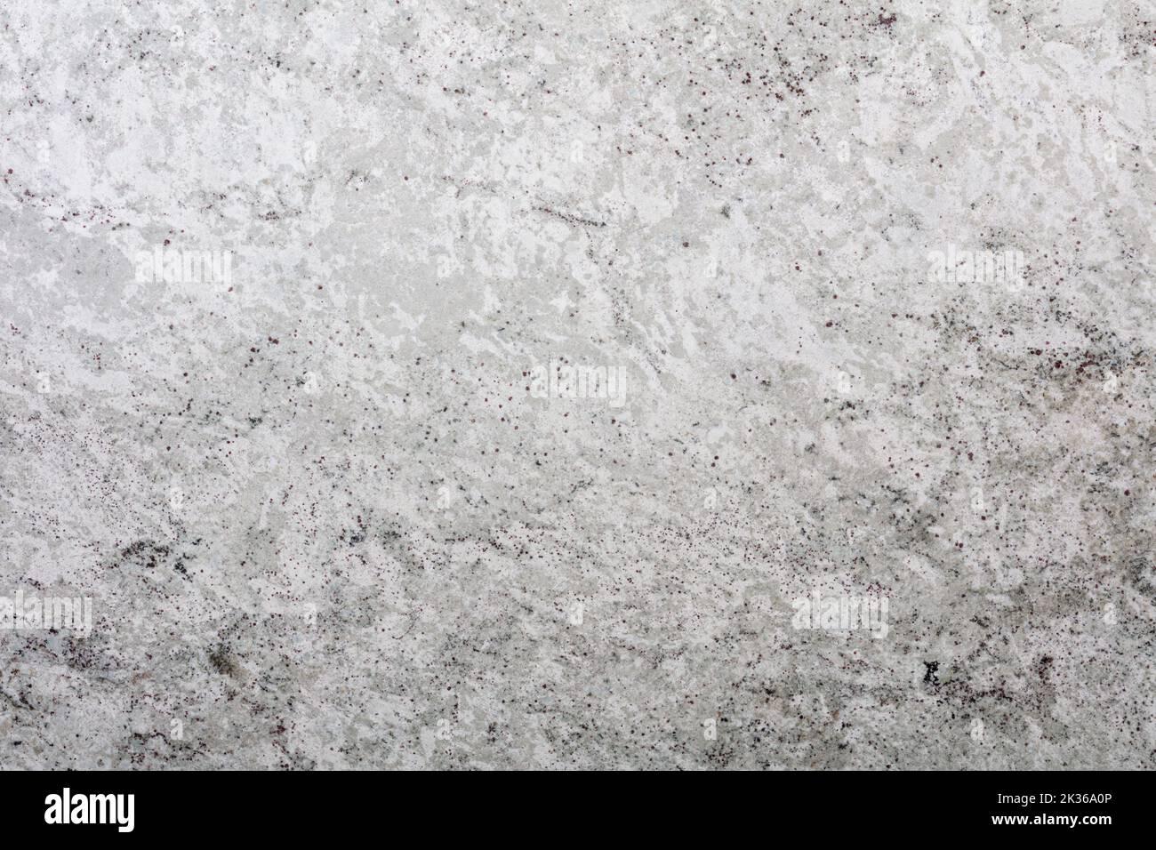Colonial White Granite background, light texture for your natural interior. Slab photo. Soft light grey matt Italian stone pattern for exterior home Stock Photo