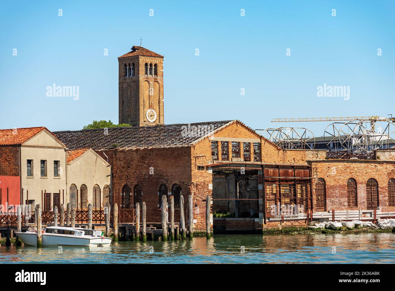 Murano island, bell tower of the Cathedral, Basilica of saints Maria and Donato, VII century, ancient glass factories. Venice lagoon, Veneto, Italy. Stock Photo