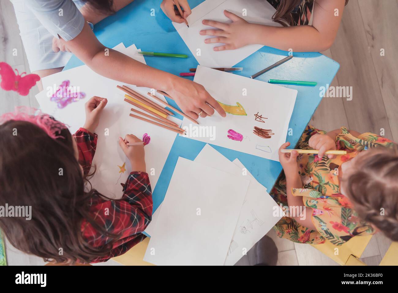 Creative kids during an art class in a daycare center or elementary ...
