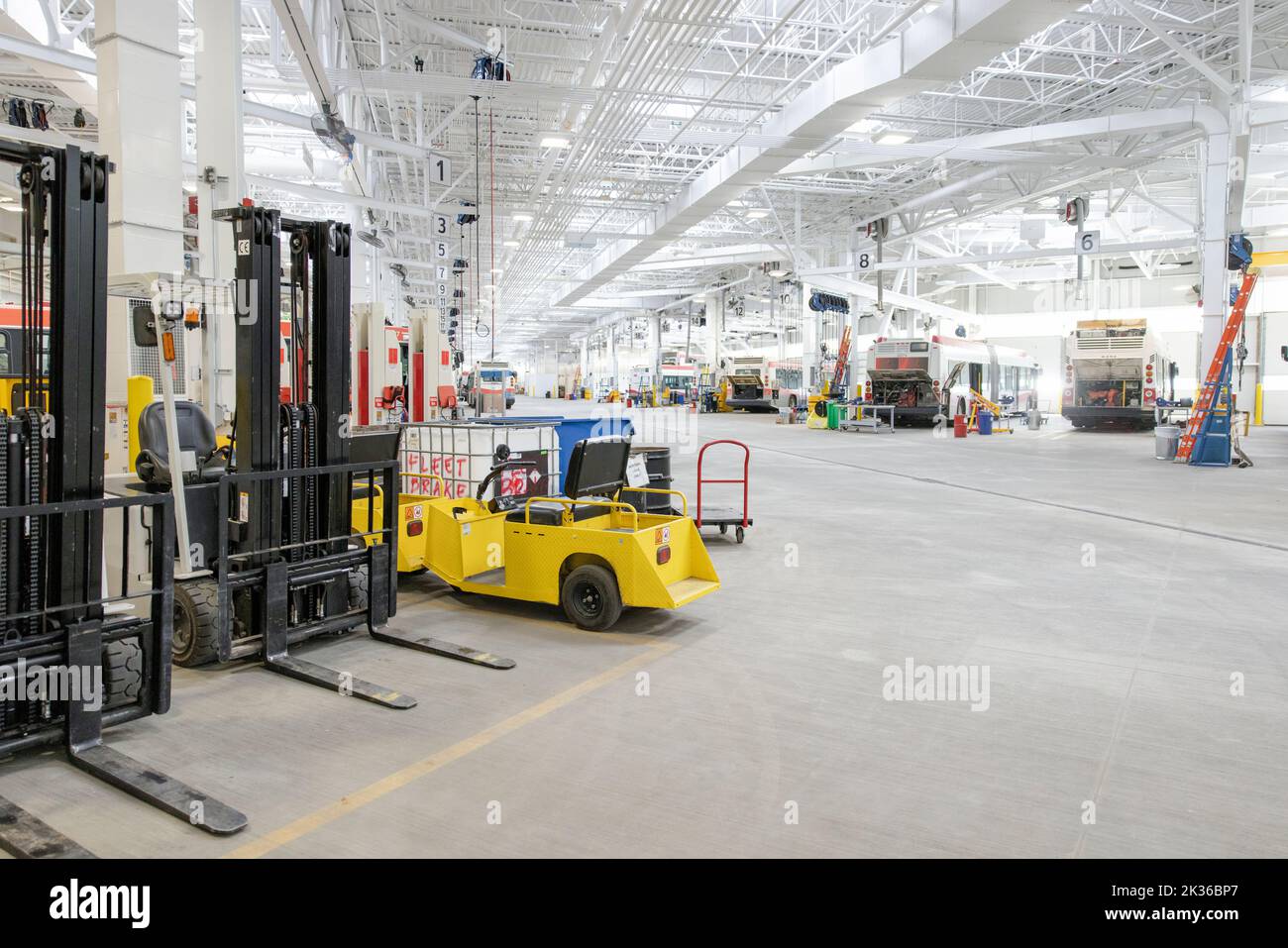 Equipment in bus maintenance facility Stock Photo Alamy