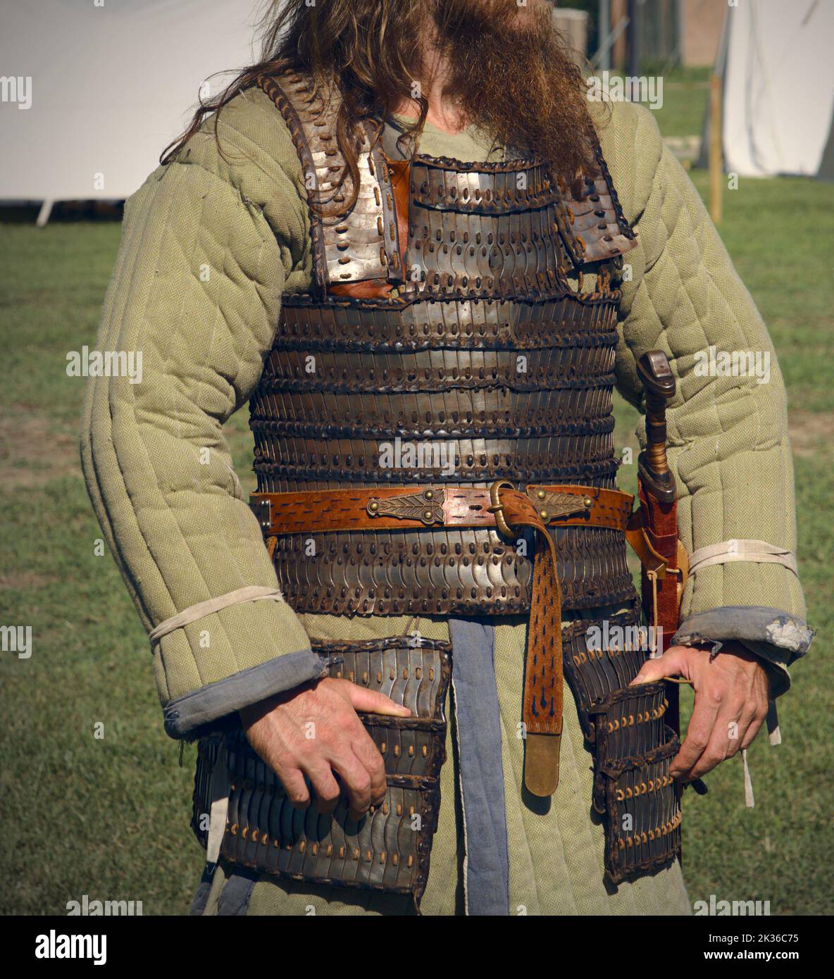 Warrior dressing armor Stock Photo
