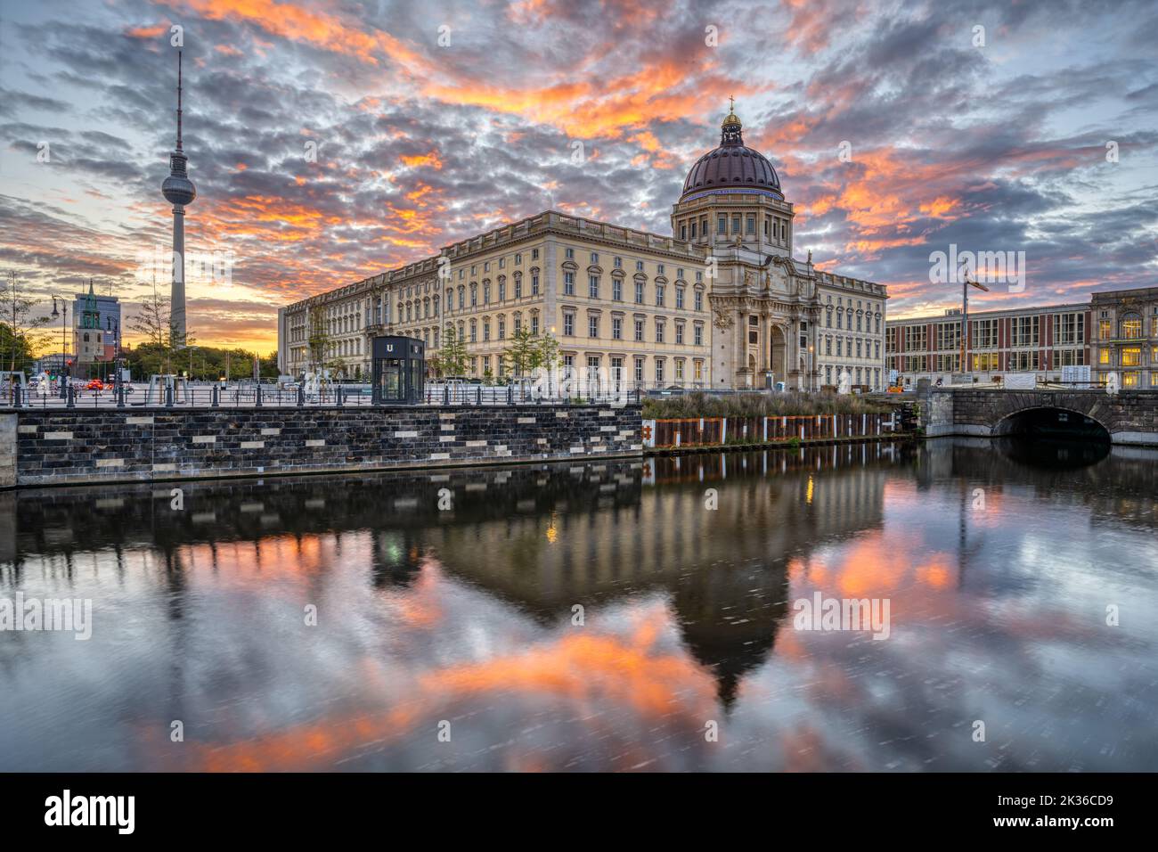 The reconstructed Berlin City Palace with the Television Tower before sunrise Stock Photo