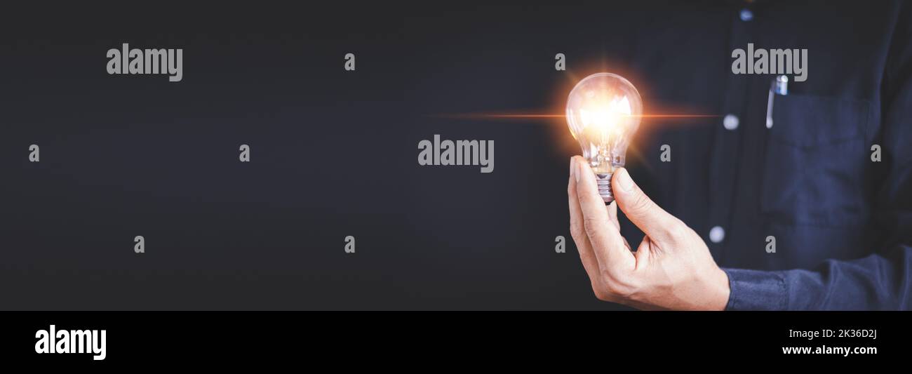 Idea innovation and inspiration concept. Hand of man holding ...