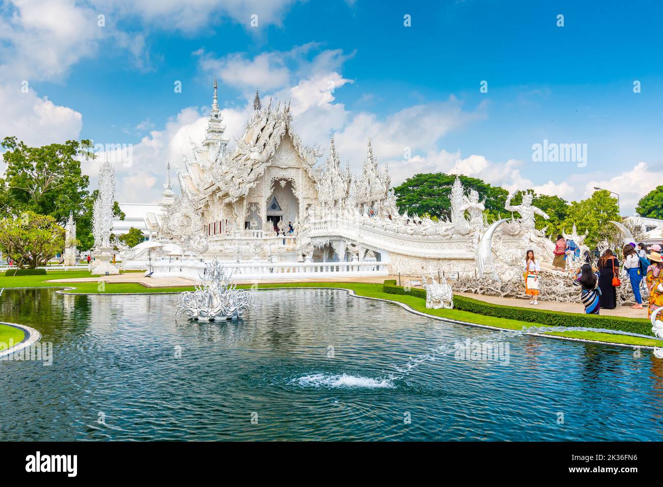 CHIANG RAI, THAILAND - 6.11.2019: Tourists visit famous white temple ...