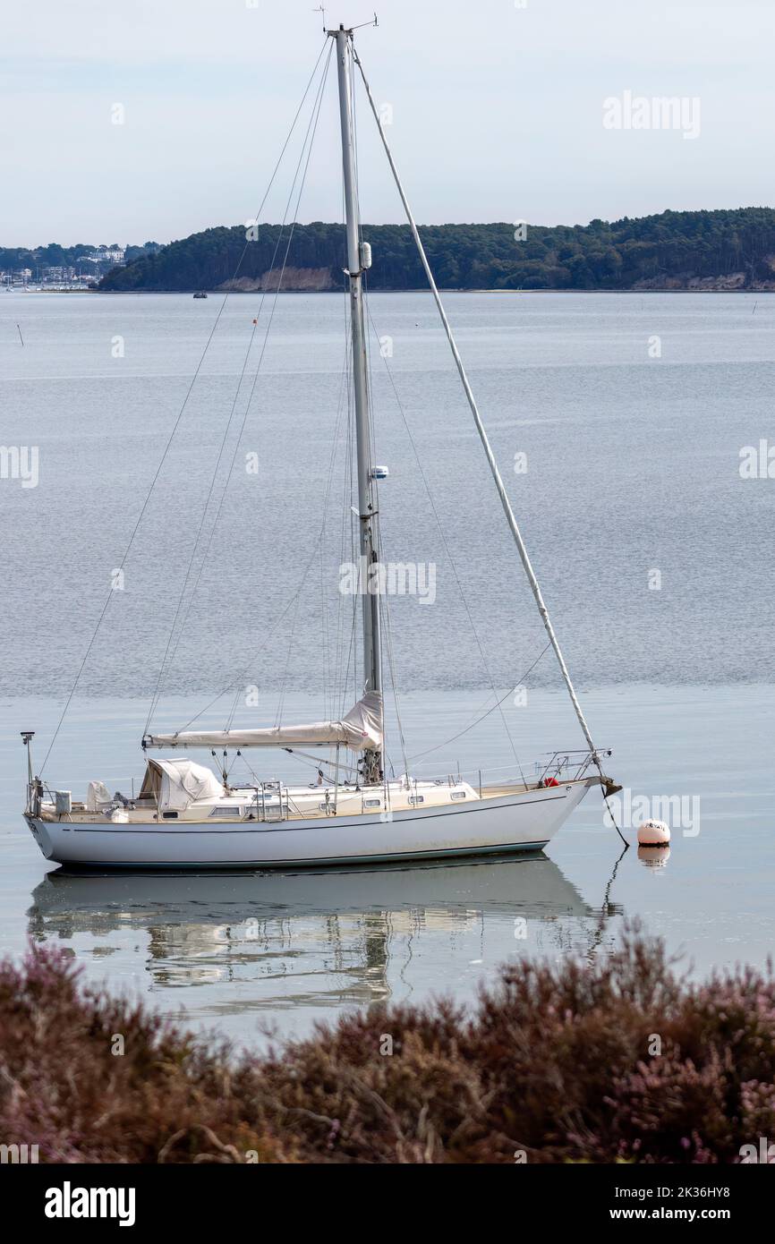 Arne, Dorset, UK - September 20 : View of a yacht moored near Arne in Dorset on September 20, 2022 Stock Photo