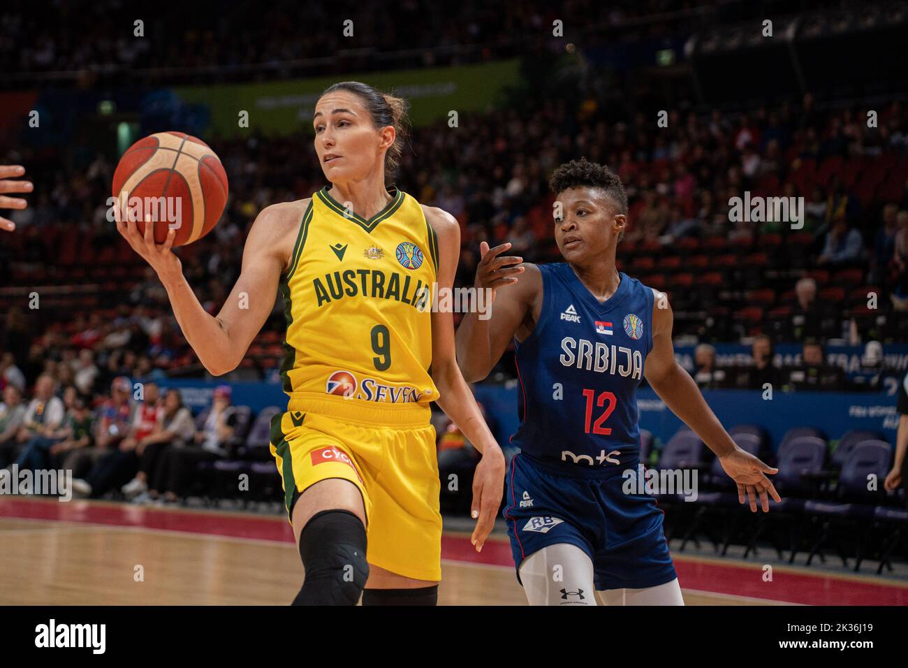Sydney, Australia. 25th Sep, 2022. Bec Allen (9 Australia) passes the ball whilst defended by Yvonne Anderson (12 Serbia) during the FIBA Womens World Cup 2022 game between Australia and Serbia at the Sydney Superdome in Sydney, Australia. (Foto: Noe Llamas/Sports Press Photo/C - ONE HOUR DEADLINE - ONLY ACTIVATE FTP IF IMAGES LESS THAN ONE HOUR OLD - Alamy) Credit: SPP Sport Press Photo. /Alamy Live News Stock Photo