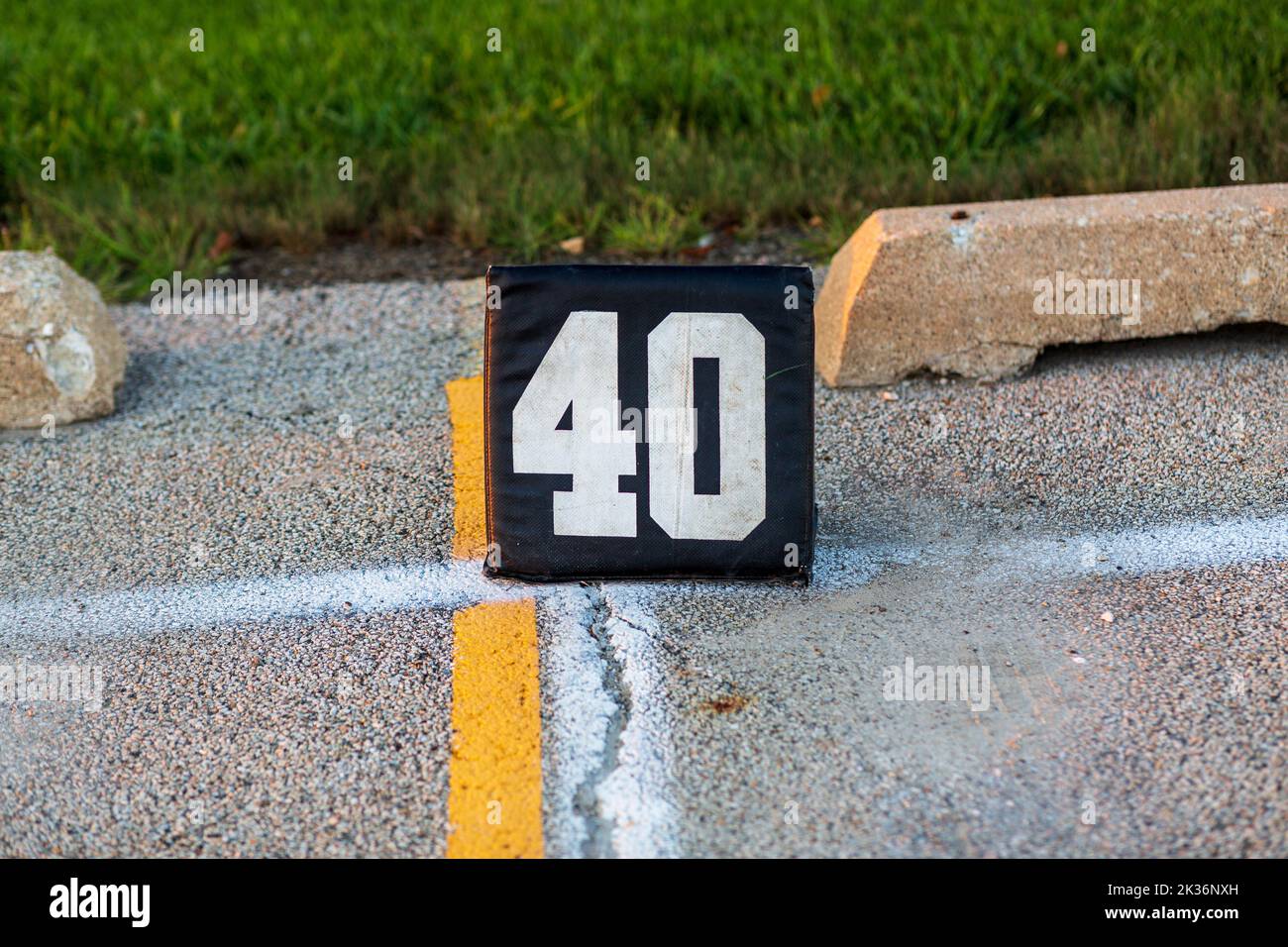 forty yard line marker ready for a marching band rehearsal Stock Photo