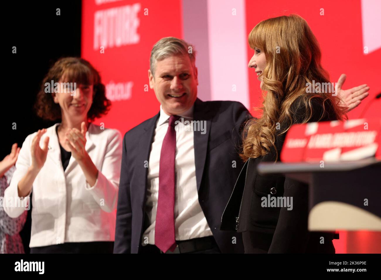 Britain's Labour Party leader Keir Starmer, Labour Party Chair Anneliese Dodds applaud after deputy leader Angela Rayner's speech at Britain's Labour Party's annual conference in Liverpool, Britain, September 25, 2022. REUTERS/Phil Noble Stock Photo