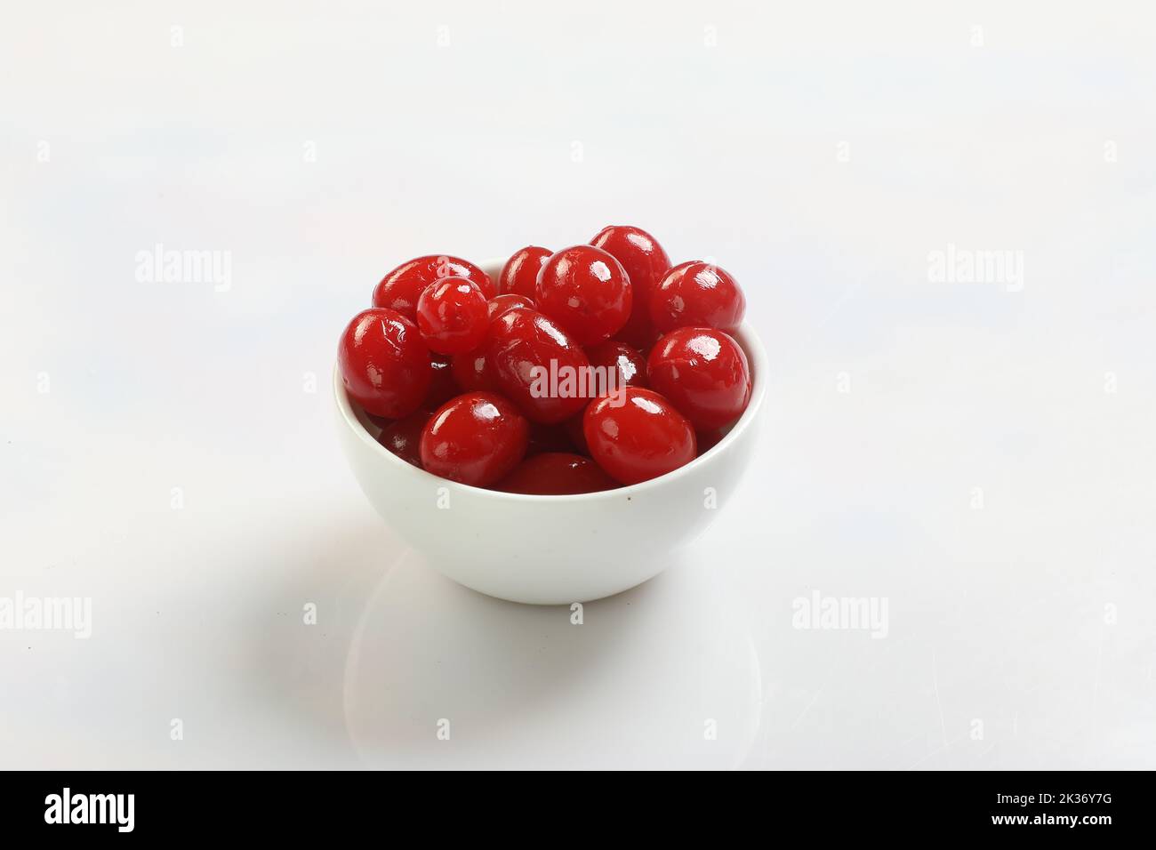 bowl of fresh red cherries fruits and vegetables Isolated on white