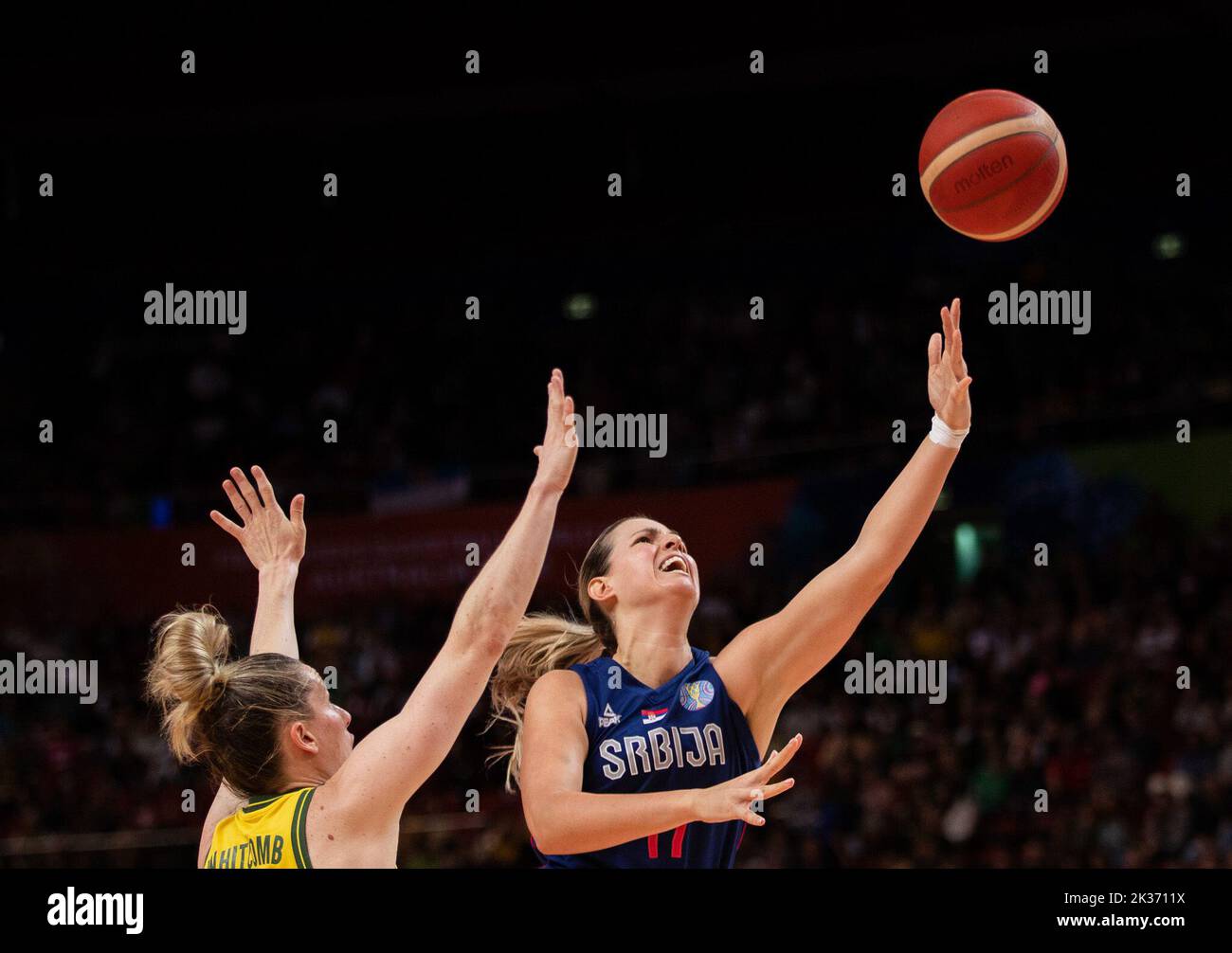 Sydney, Australia. 25th Sep, 2022. Jovana Nogic (R) of Serbia goes up for a basket during a