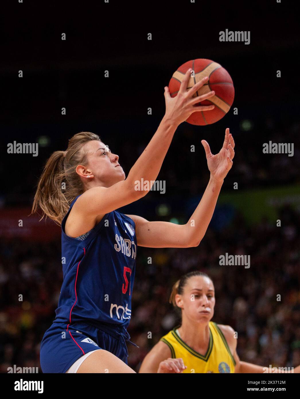 Sydney, Australia. 25th Sep, 2022. Mina Djordjevic (L) of Serbia goes up for a basket during a Group B match against Australia at the FIBA Women's Basketball World Cup 2022 in Sydney, Australia, Sept. 25, 2022. Credit: Hu Jingchen/Xinhua/Alamy Live News Stock Photo
