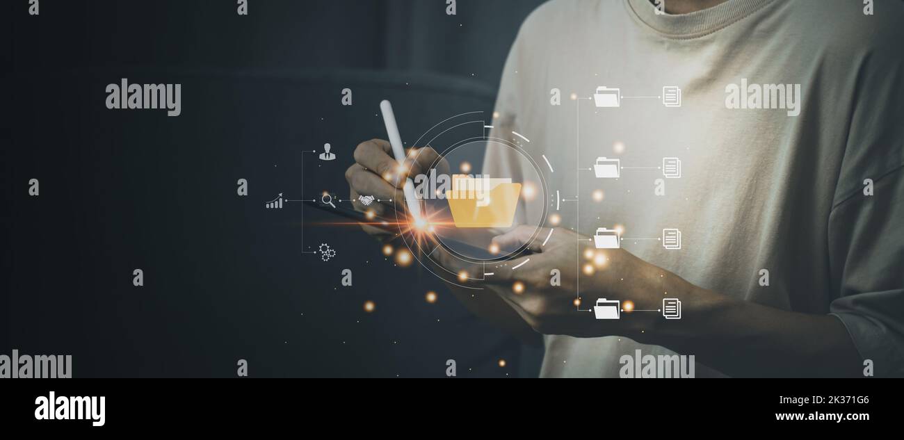 Cloud computing technology concept. Man hold tablet and smart pen using bigdata. Internet storage network system. Business and finance. Stock Photo