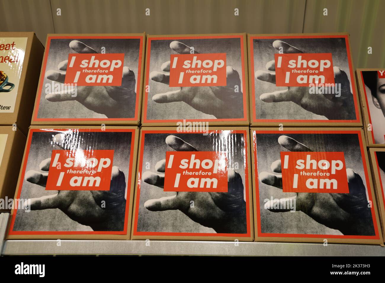 Posters with text 'I shop, therefore I am', exhibited at the Retrofuture expo in the Evoluon Stock Photo