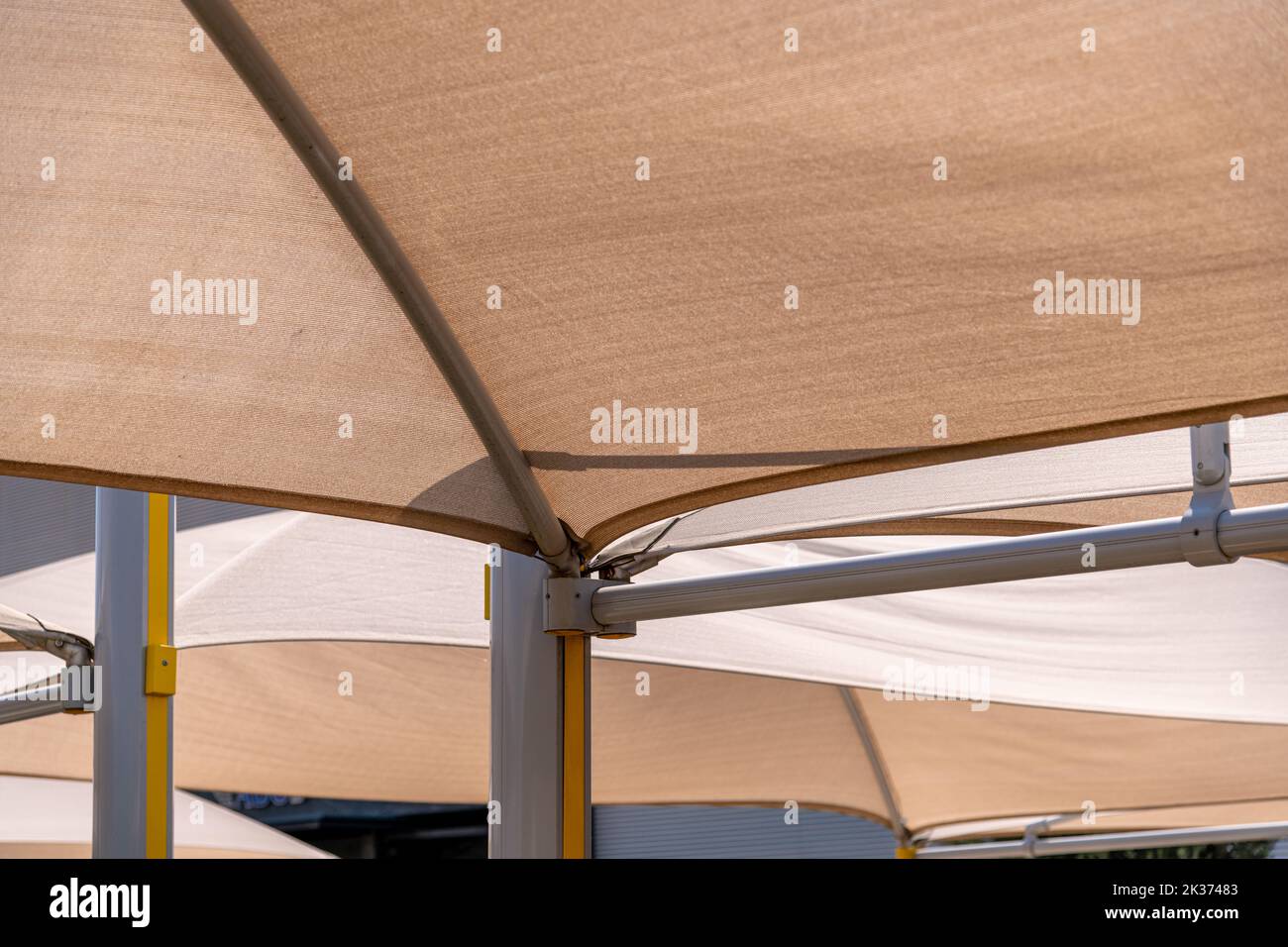 parking lot steel frame awning protection on a sunny day Stock Photo
