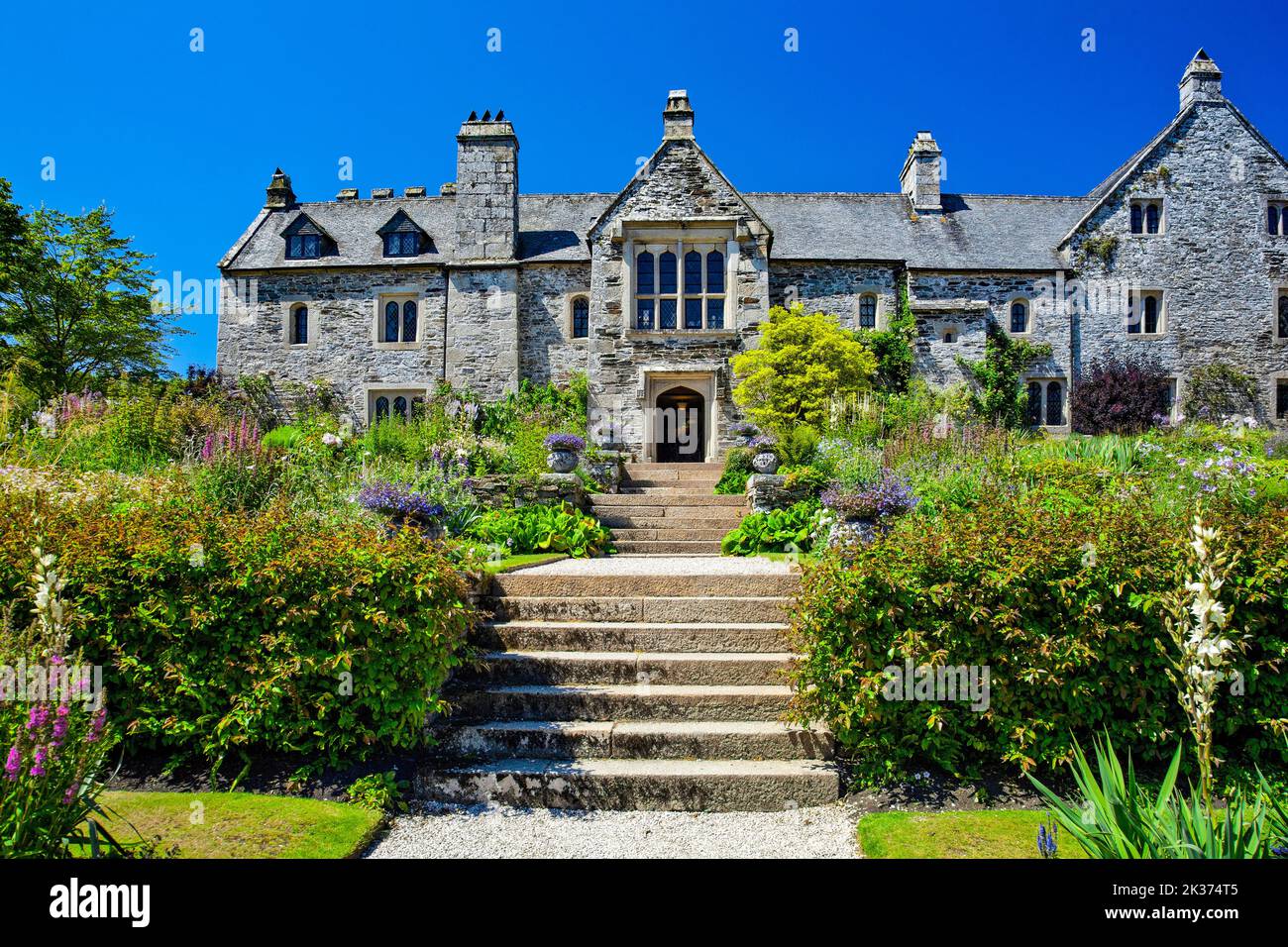 The colourful terraced garden at the medieval tudor manor house at Cothele, nr Calstock, Cornwall, England, UK Stock Photo