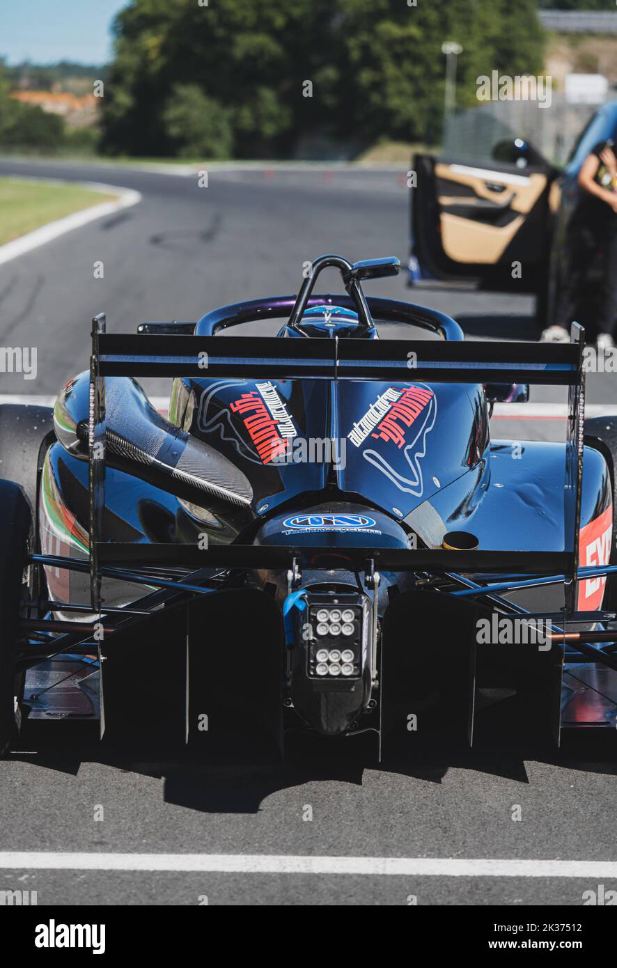 Rear view of racing formula car standing in racetrack starting grid pole position driver point of view. Vallelunga, Italy, september 17-18 2022, Racin Stock Photo