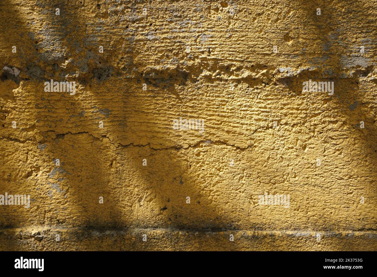 yellow plastered old wall floor, background Stock Photo