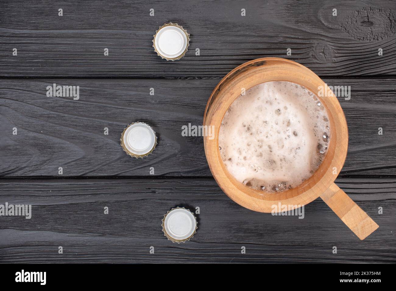top view, on a cup with beer and lids Stock Photo Alamy