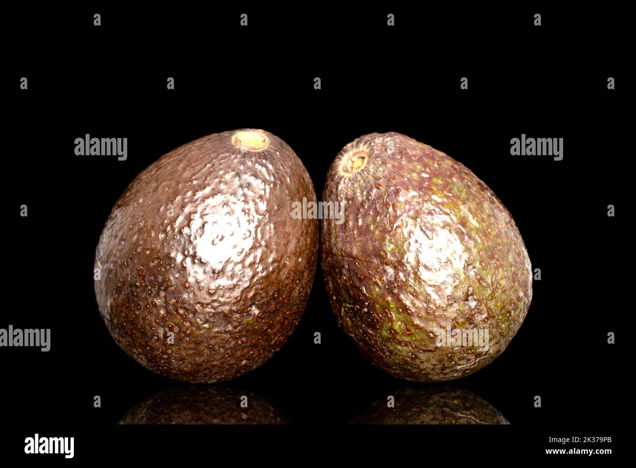 Two ripe avocados, macro, isolated on black background Stock Photo Alamy