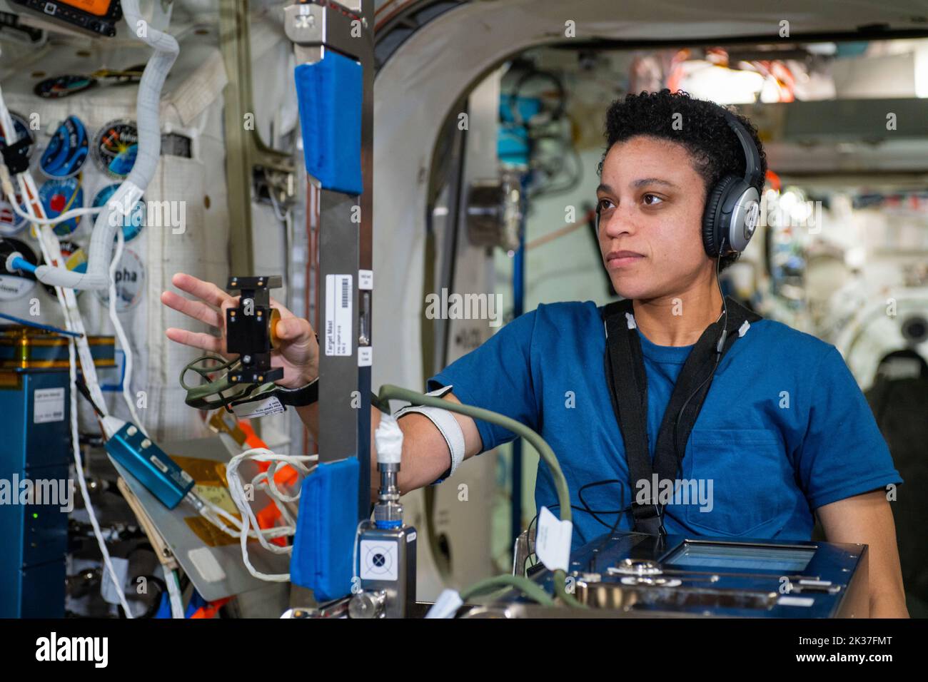 ISS - 06 July 2022 - NASA astronaut and Expedition 67 Flight Engineer Jessica Watkins is seated inside the Columbus laboratory module participating in Stock Photo