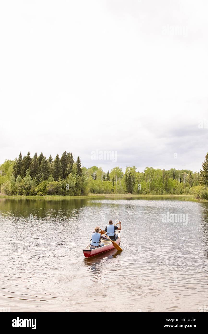 Man woman paddling canoe river hires stock photography and images Alamy